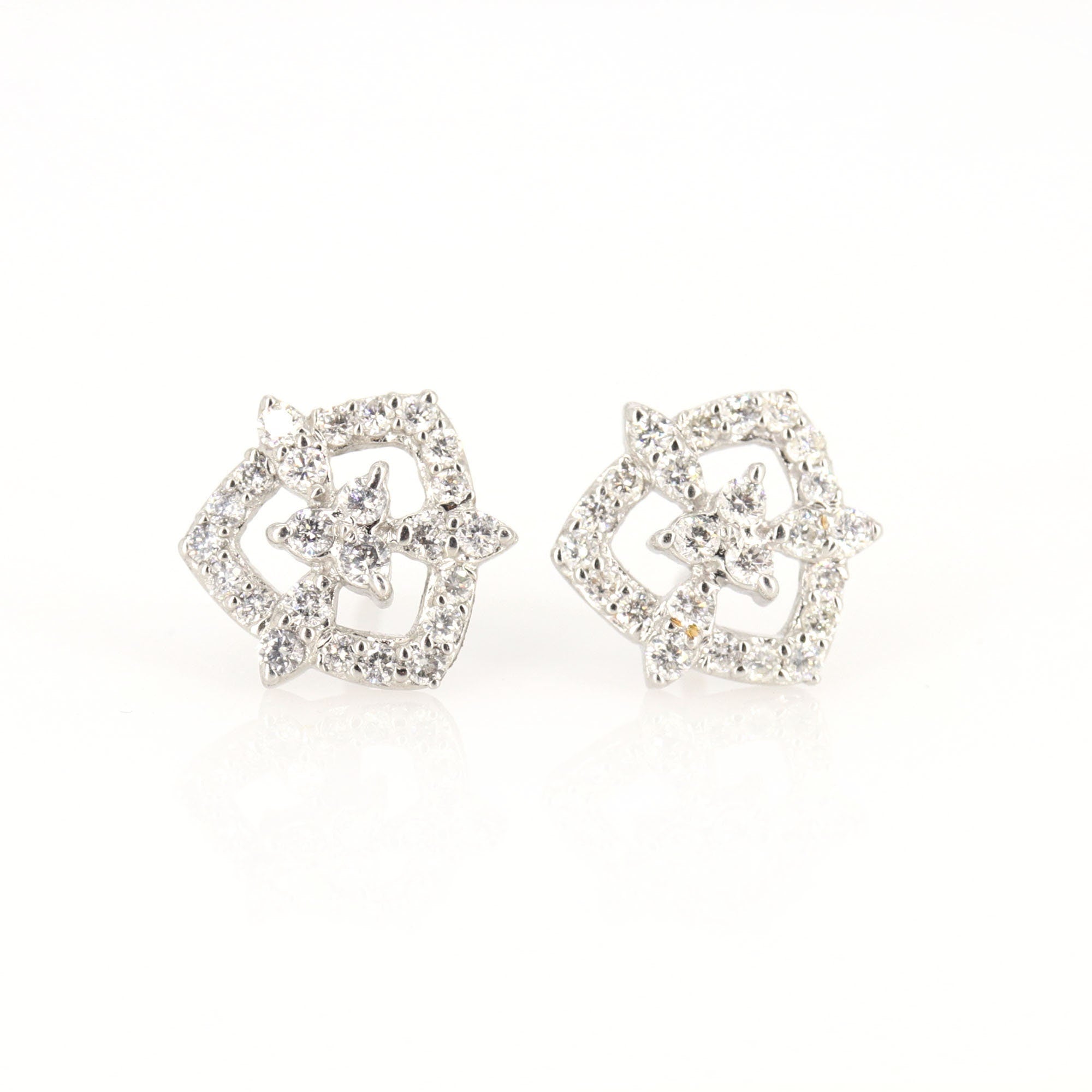 White Studs 0.64 Earring 18K Gold
