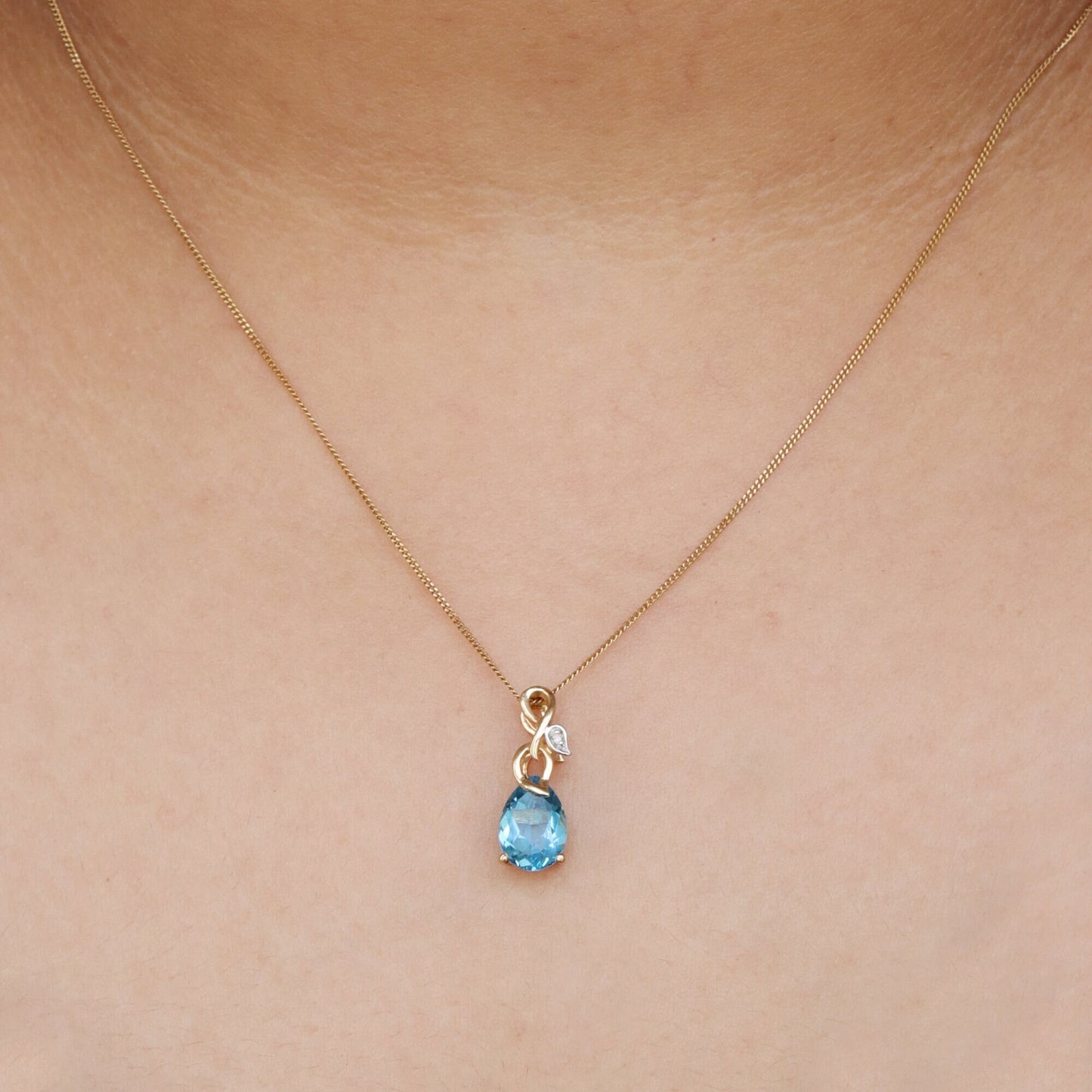 Pear Shape Designer Loop Blue Topaz Necklace 14K Gold